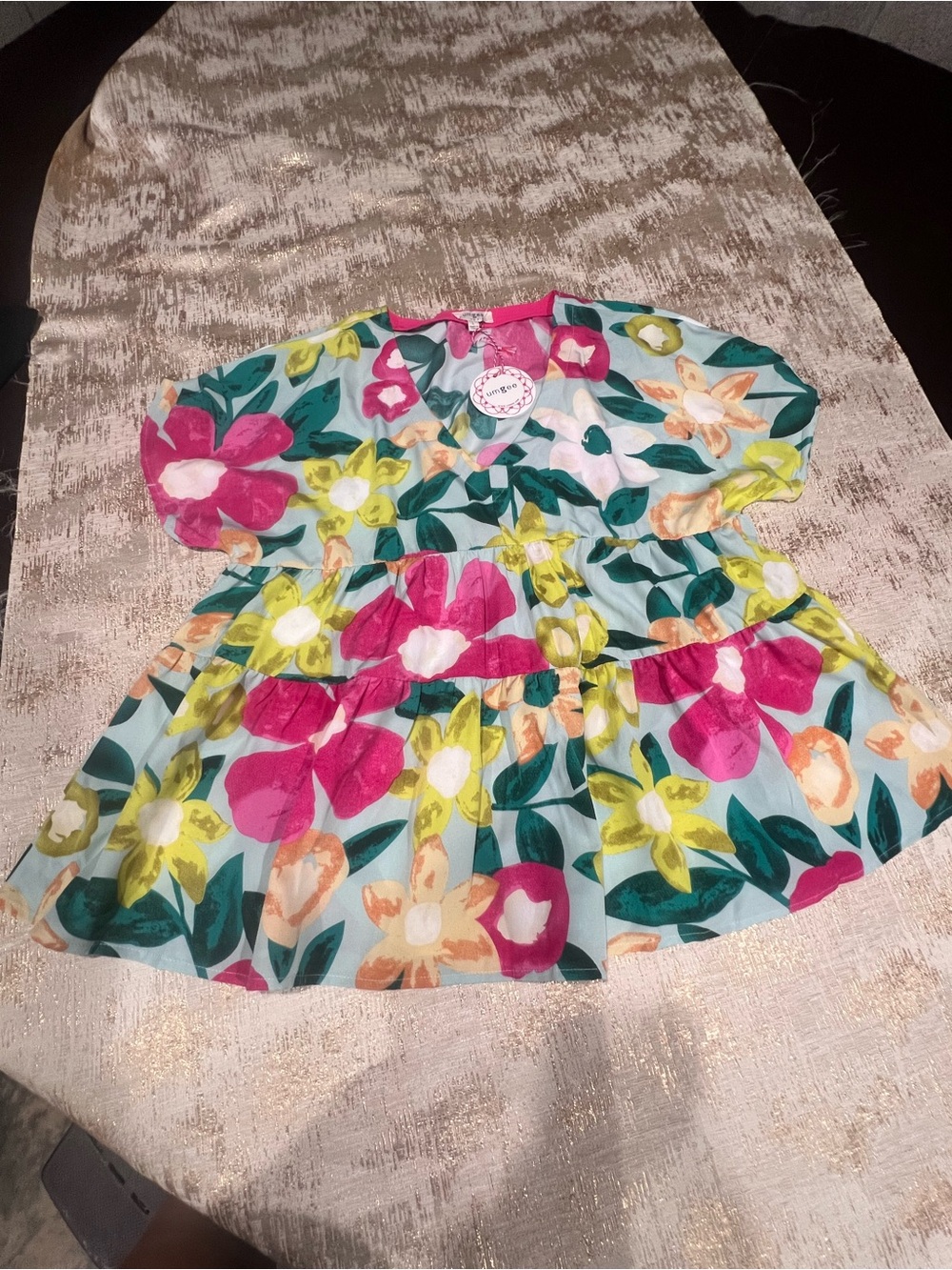 Umgee floral babydoll shirt with pink, yellow, and green flowers